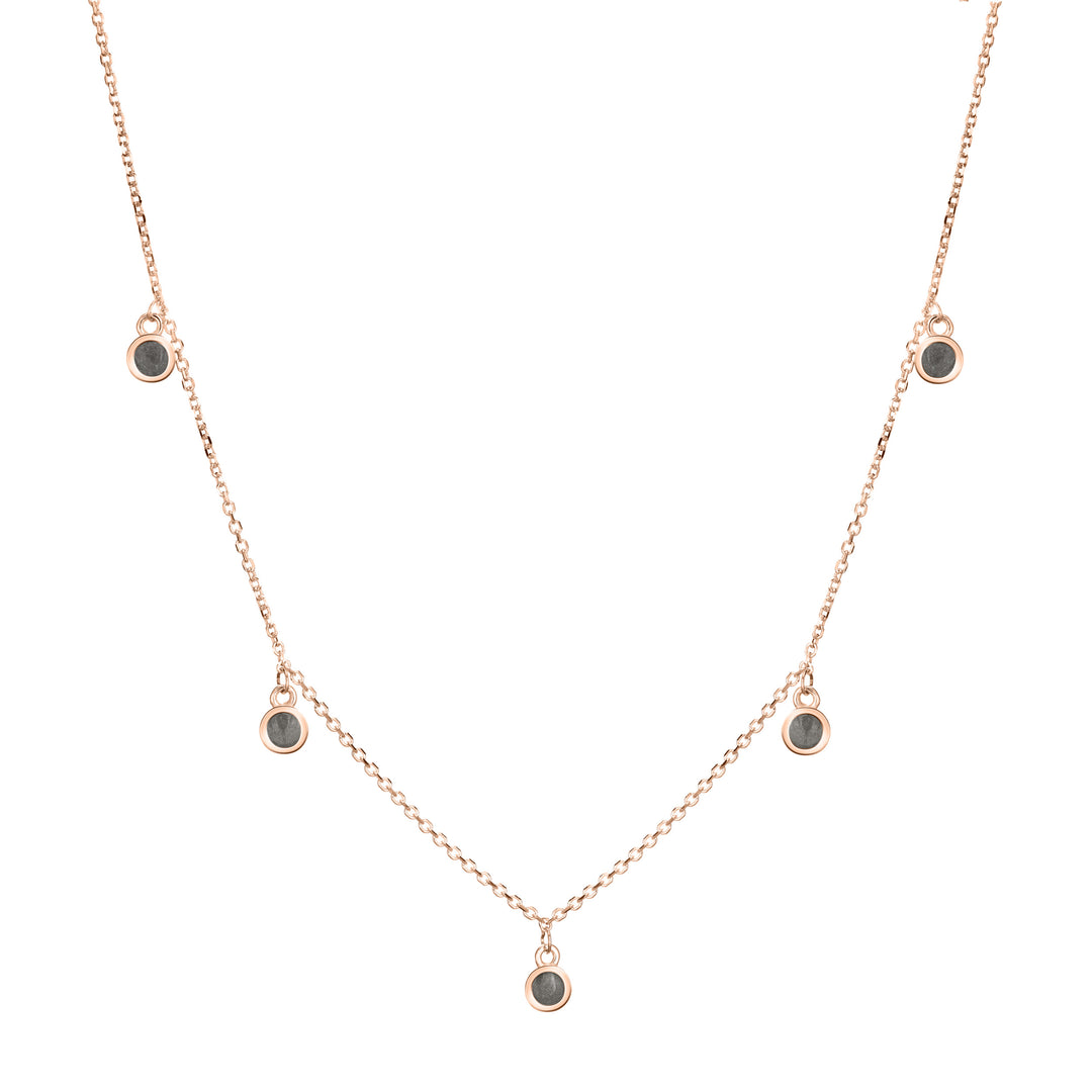 This photo shows close by me jewelry's 14K Rose Gold Drop Cremains Necklace with Five Ashes Components from the front