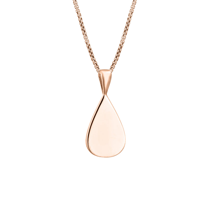 This photo shows the Fancy Bail Teardrop Pendant in 14K Rose Gold designed and set with ashes by close by me jewelry from the back