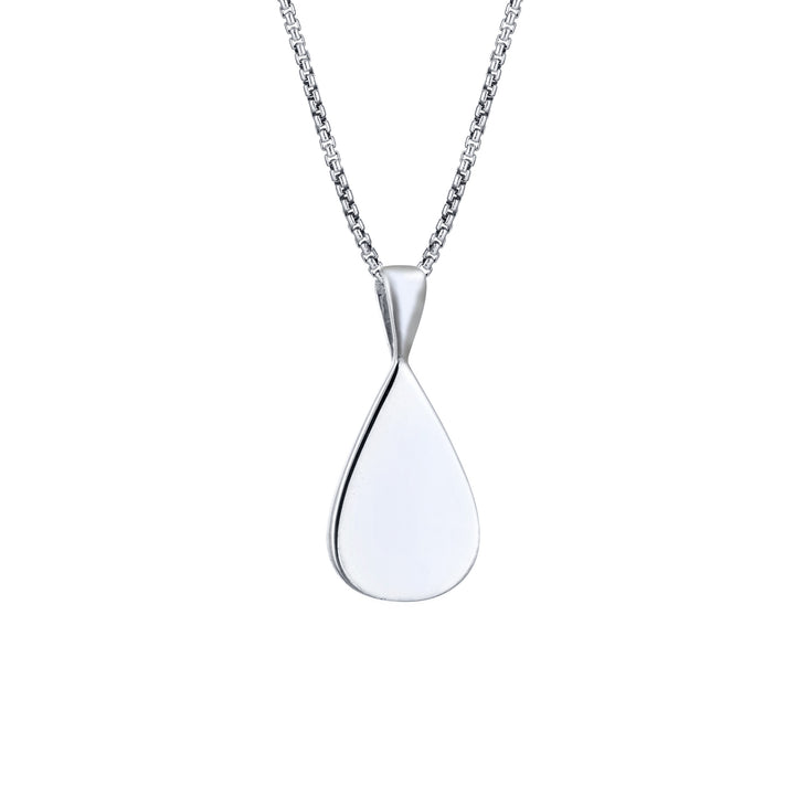 This photo shows the Fancy Bail Teardrop Cremation Pendant in 14K White Gold designed and set with ashes by close by me jewelry from the back