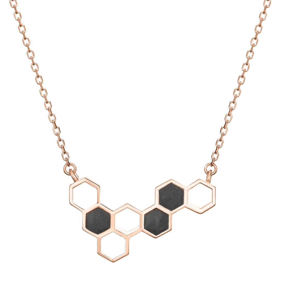 This photo shows the 14K Rose Gold Hexagon Ashes Cluster Necklace designed by close by me jewelry from the front