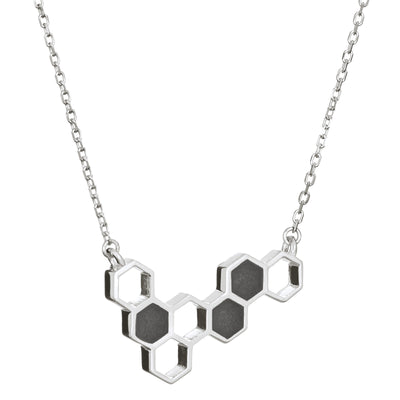 This photo shows the Sterling Silver Hexagon Cluster Cremation Necklace designed by close by me jewelry from the side