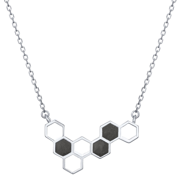 This photo shows the 14K White Gold Hexagon Cluster Ashes Necklace designed by close by me jewelry from the front