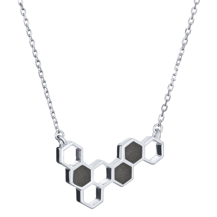 This photo shows the 14K White Gold Hexagon Cluster Ashes Necklace designed by close by me jewelry from the side