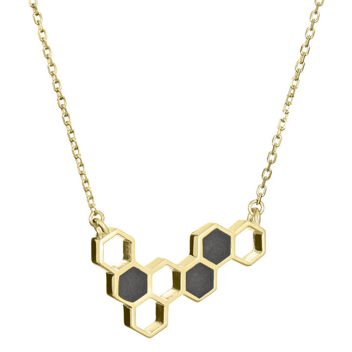 This photo shows the 14K Yellow Gold Hexagon Cluster Cremains Pendant designed by close by me jewelry from the side