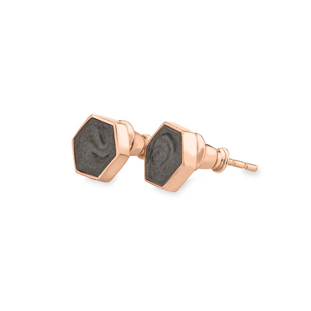 Hexagon stud cremation earrings in 14k rose gold shown from the side