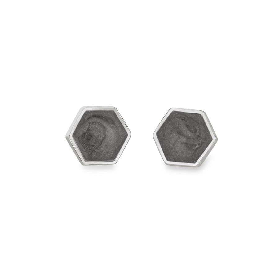 Hexagon stud cremation earrings in sterling silver featuring solidified ashes shown from the front