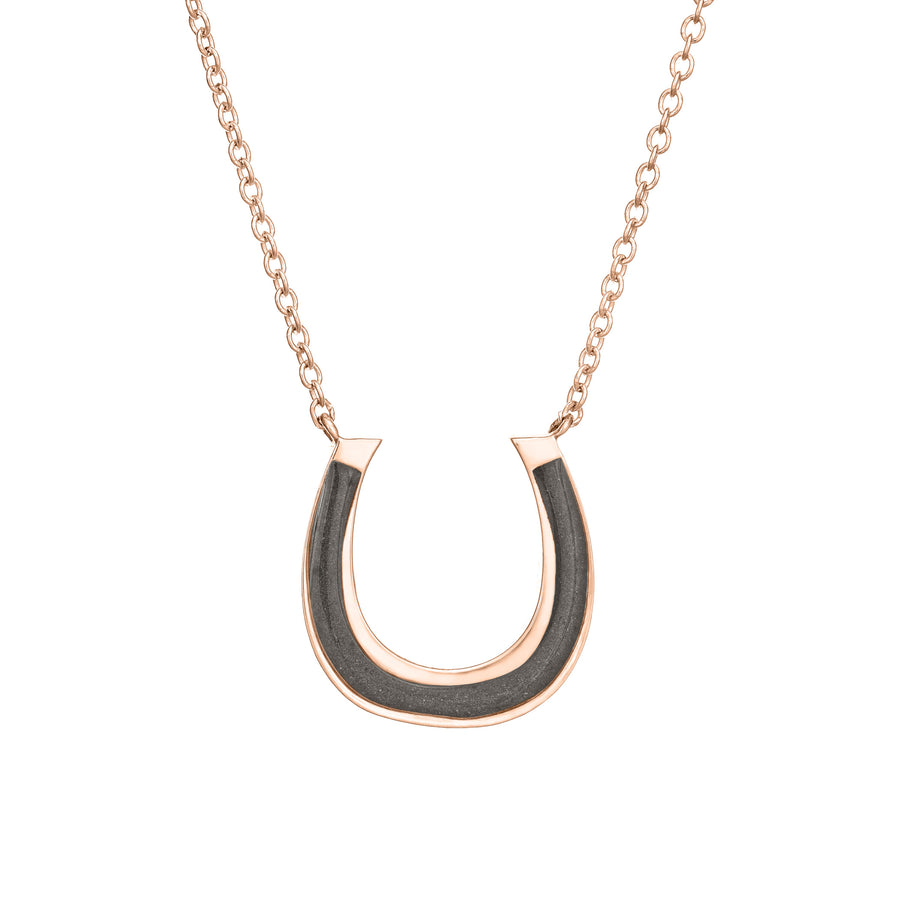 Close-up front view of Close By Me Jewelry's 14K Rose Gold Horseshoe Cremation Necklace set against a white background.