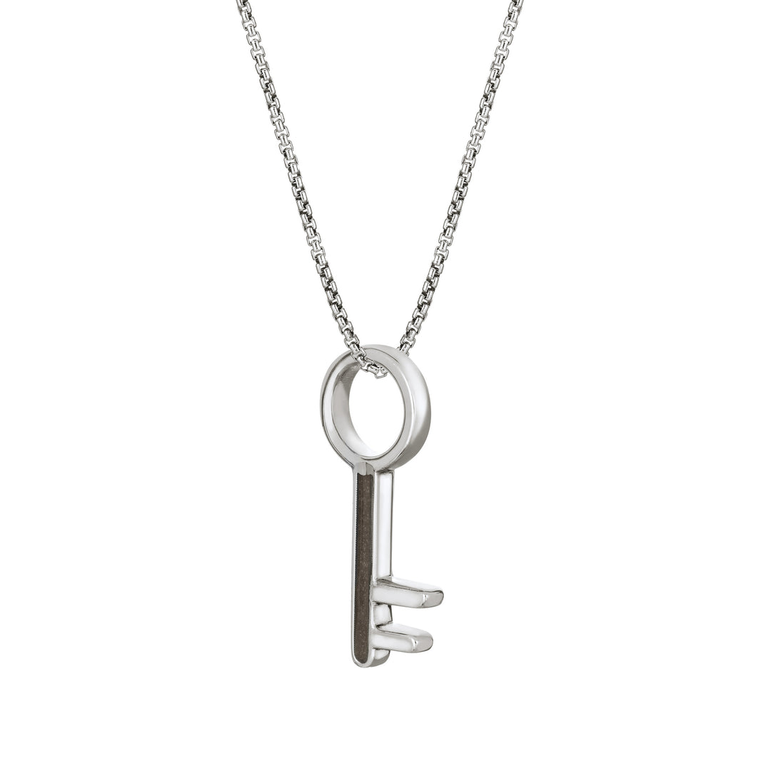 Pictured here is the Key-Shaped Cremation Pendant designed by close by me jewelry in Sterling Silver from the side