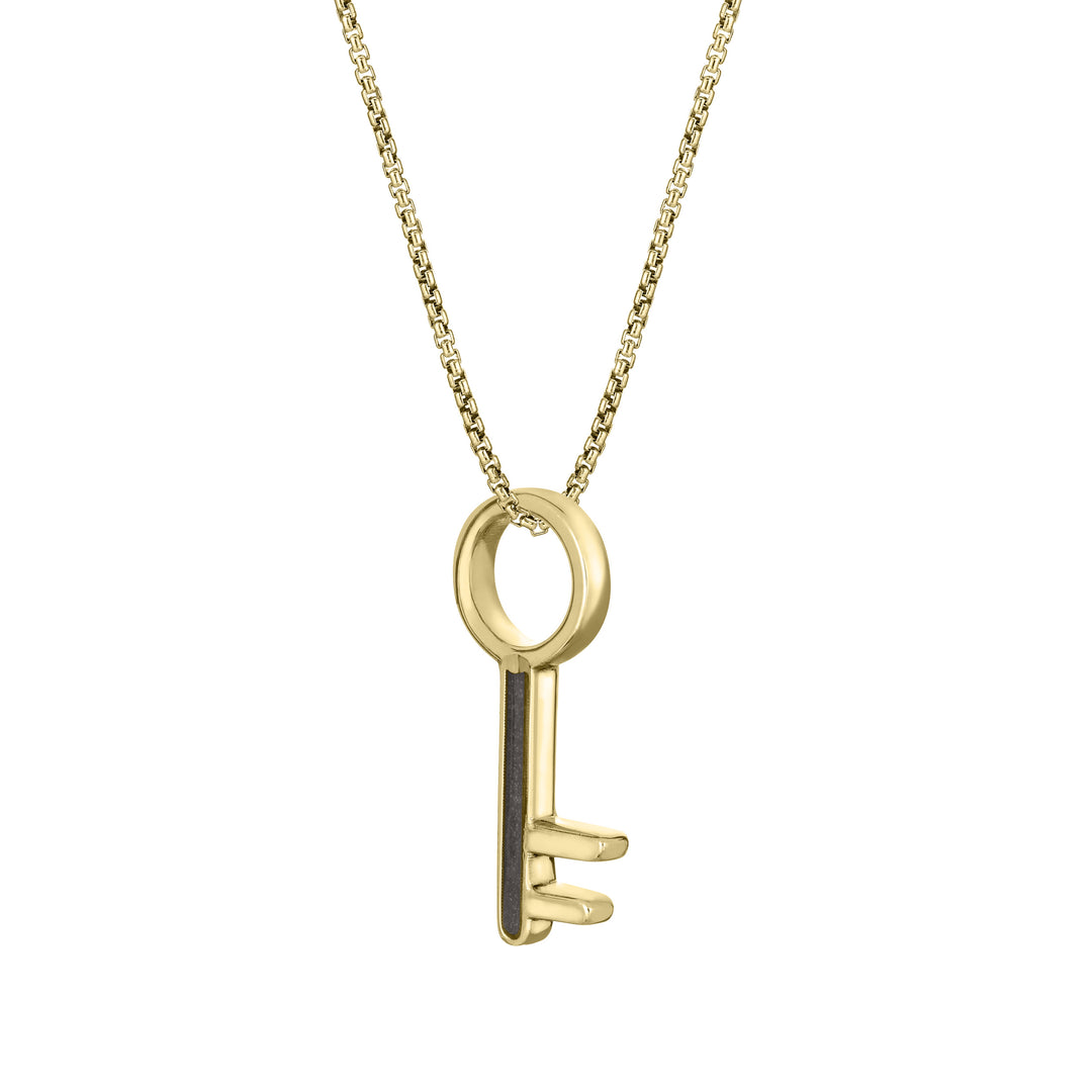 Pictured here is the Key-Shaped Cremated Remains Necklace designed by close by me jewelry in 14K Yellow Gold from the side