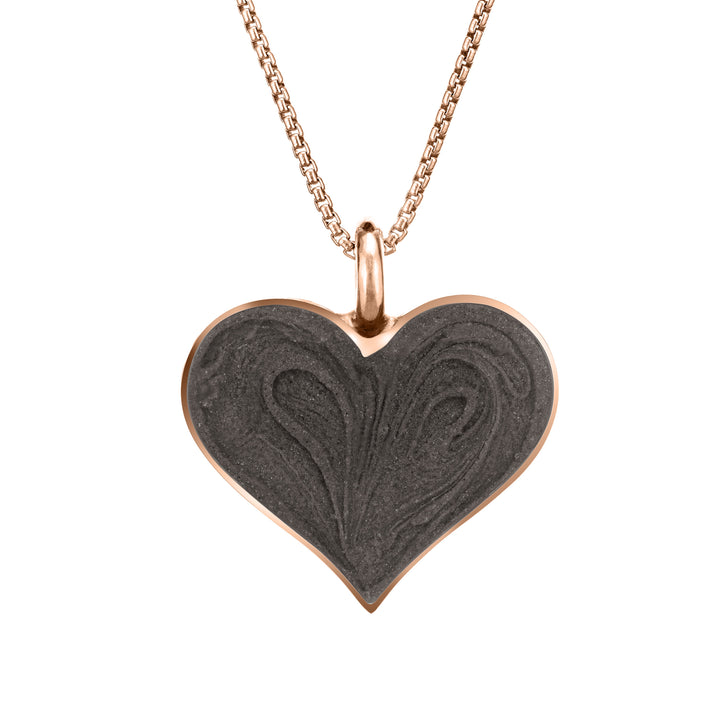 The 14k rose gold large heart pendant with ashes by close by me jewelry from the front