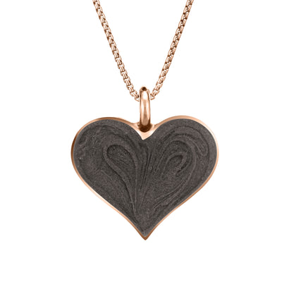 The 14k rose gold large heart pendant with ashes by close by me jewelry from the front