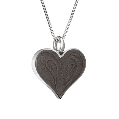 The sterling silver large heart memorial pendant by close by me jewelry from an angle