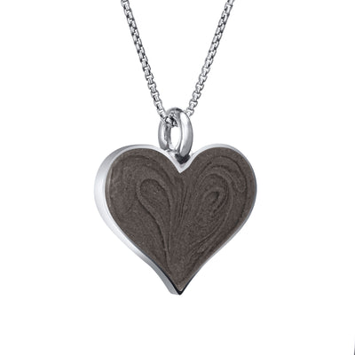 The 14k white gold large heart pendant with cremated remains by close by me jewelry from an angle