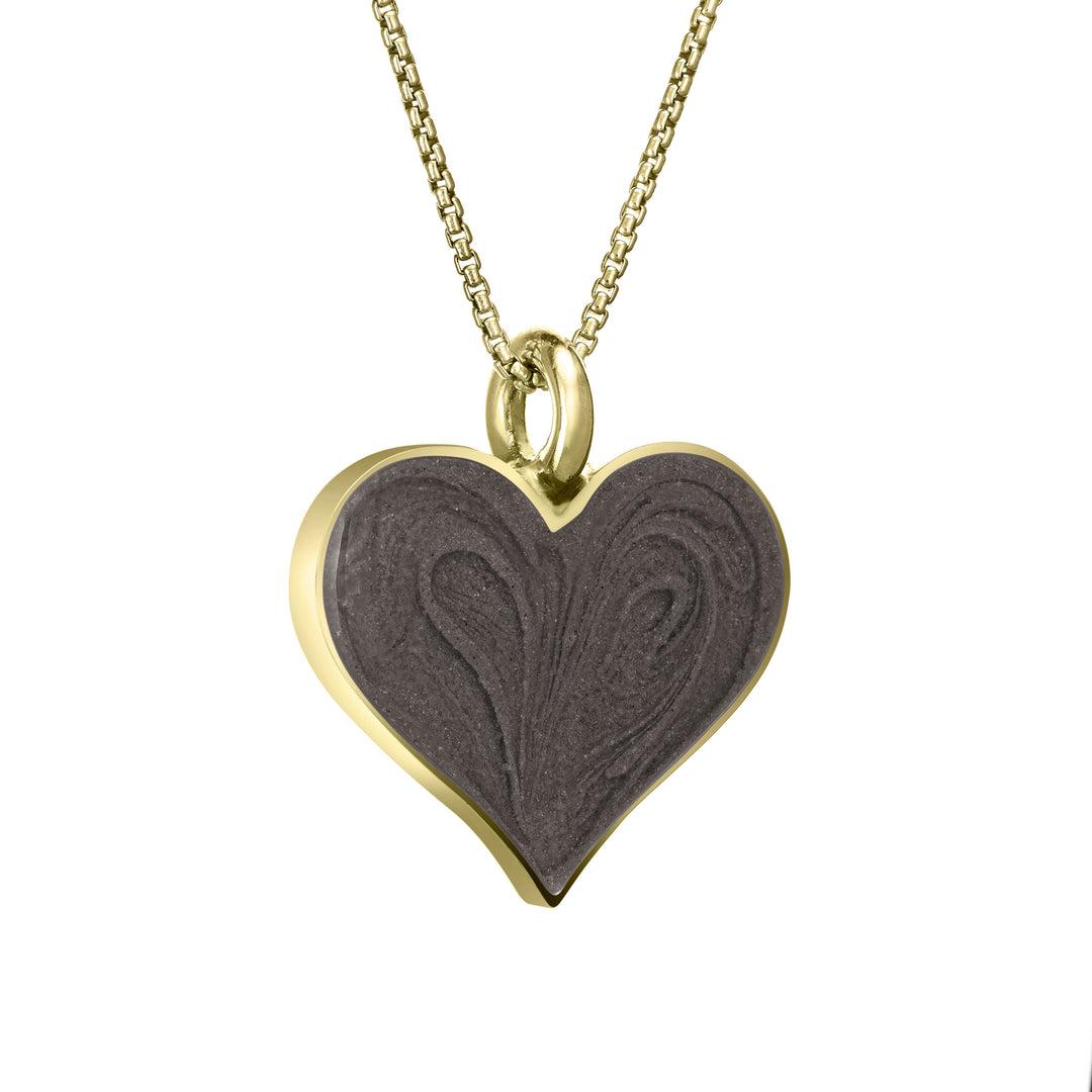 The 14k yellow gold large heart memorial pendant by close by me jewelry from an angle