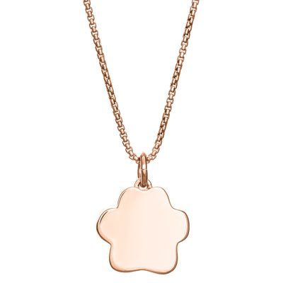 This photo shows the Large Paw Print Cremated Remains Pendant design set with ashes in 14K Rose Gold by close by me jewelry from the back