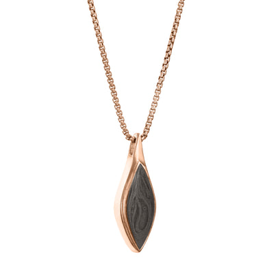The Leaf Cremation Pendant in 14K Rose Gold, designed and set with ashes by close by me jewelry from the side