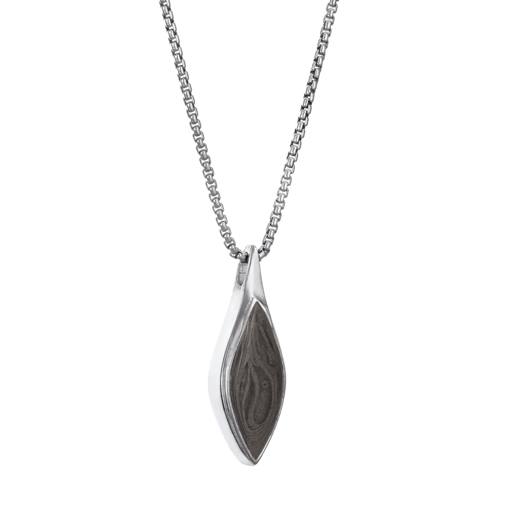 The Leaf Cremains Pendant in 14K White Gold, designed and set with ashes by close by me jewelry from the side