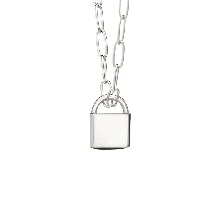 A Lock-style Cremation Necklace with a Stylized Chain with a capital "G" engraved on its front in Sterling Silver by close by me jewelry from the back