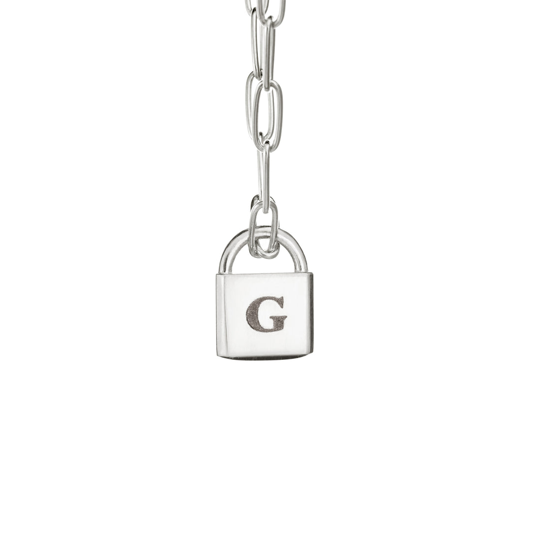 A Lock-style Cremation Necklace with a Stylized Chain with a capital "G" engraved on its front in Sterling Silver by close by me jewelry from the front
