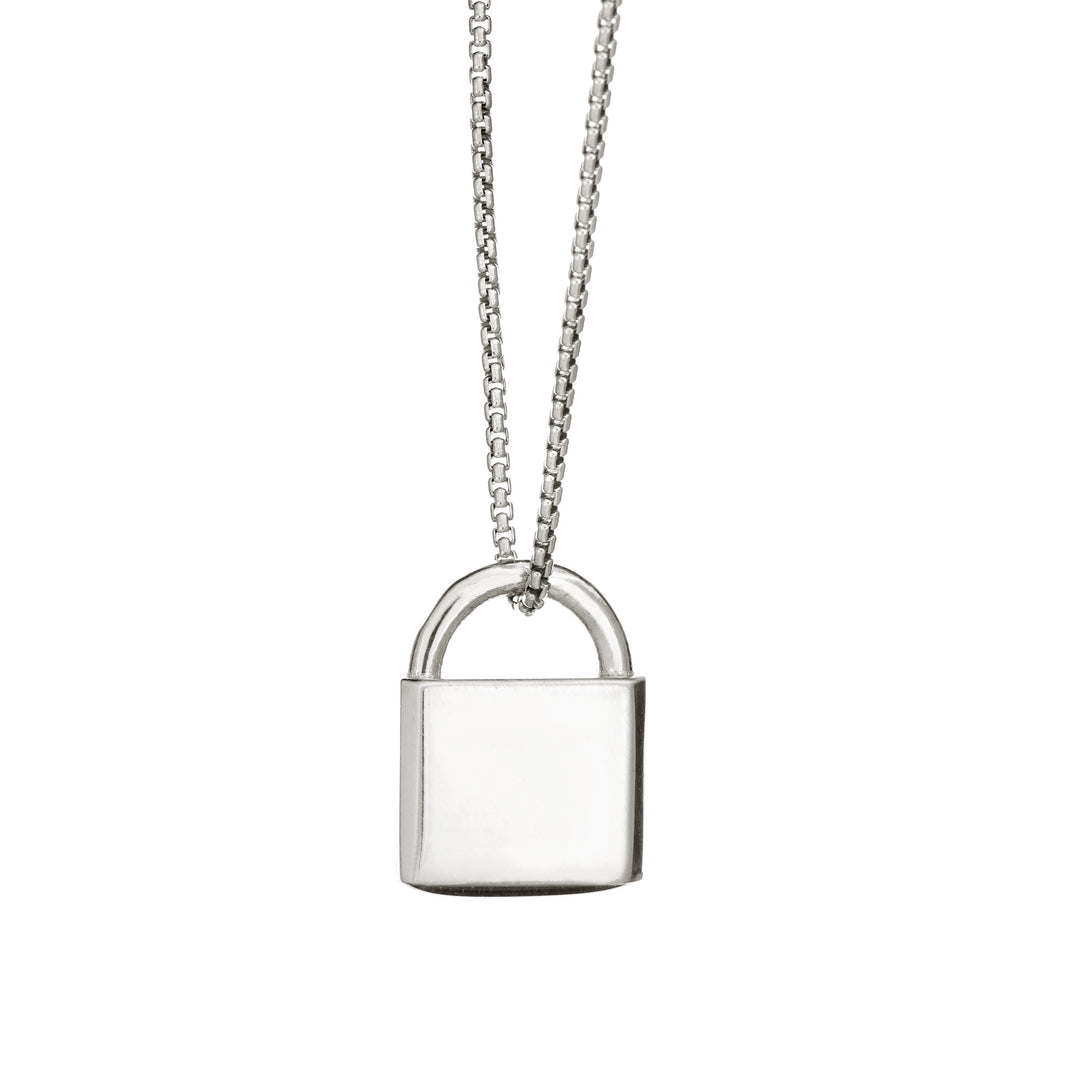 A Lock-style Cremation Pendant with a capital "G" engraved on its front in Sterling Silver by close by me jewelry from the back