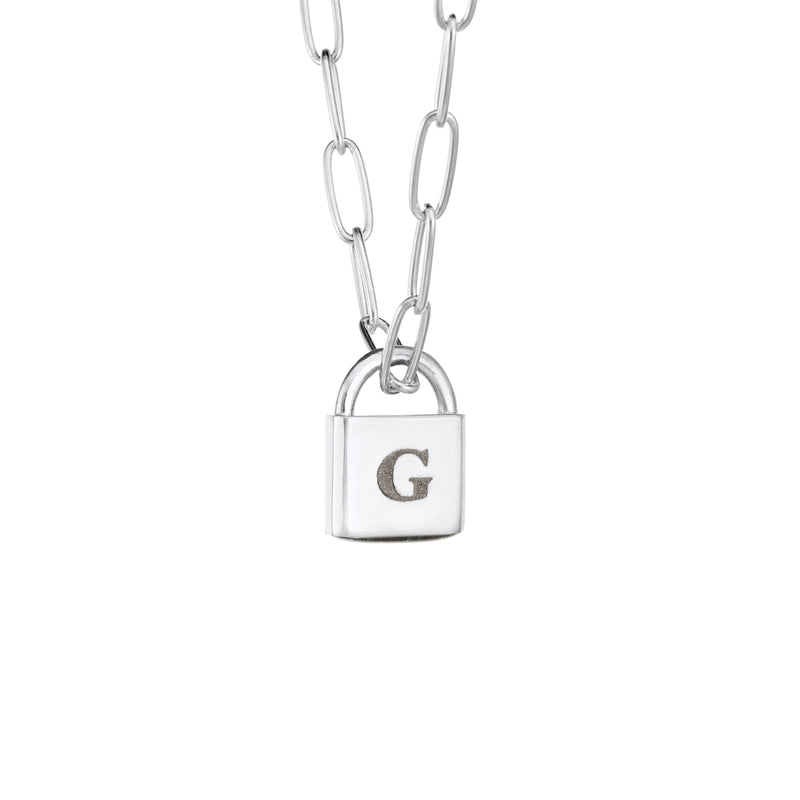 A Lock-style Cremated Remains Necklace with a Stylized Chain with a capital "G" engraved on its front in 14K White Gold by close by me jewelry from the side