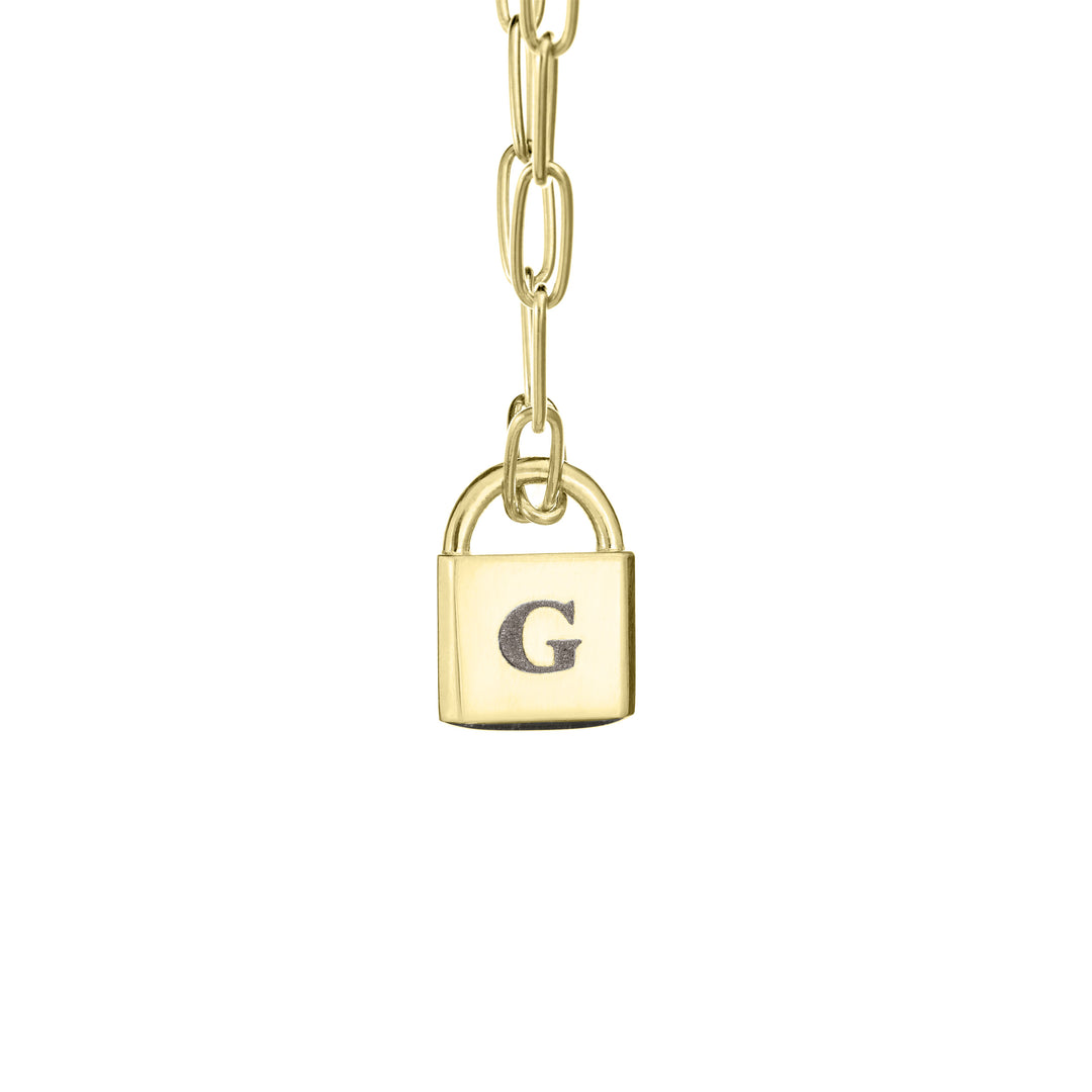 A Lock-style Cremation Necklace with a Stylized Chain with a capital "G" engraved on its front in 14K Yellow Gold by close by me jewelry from the front