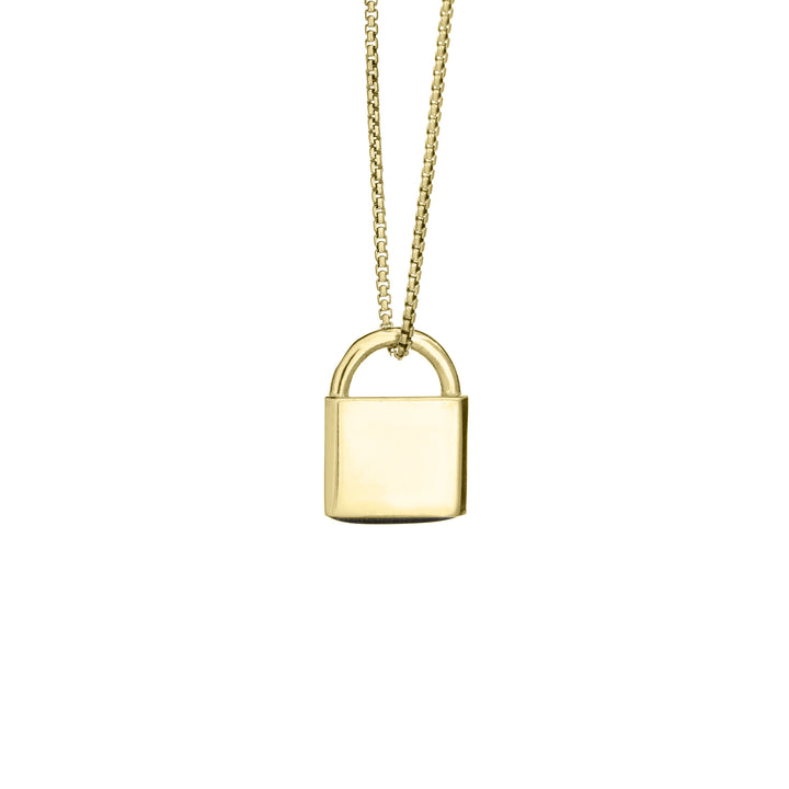 A Lock-style Cremation Pendant with a capital "G" engraved on its front in 14K Yellow Gold by close by me jewelry from the back