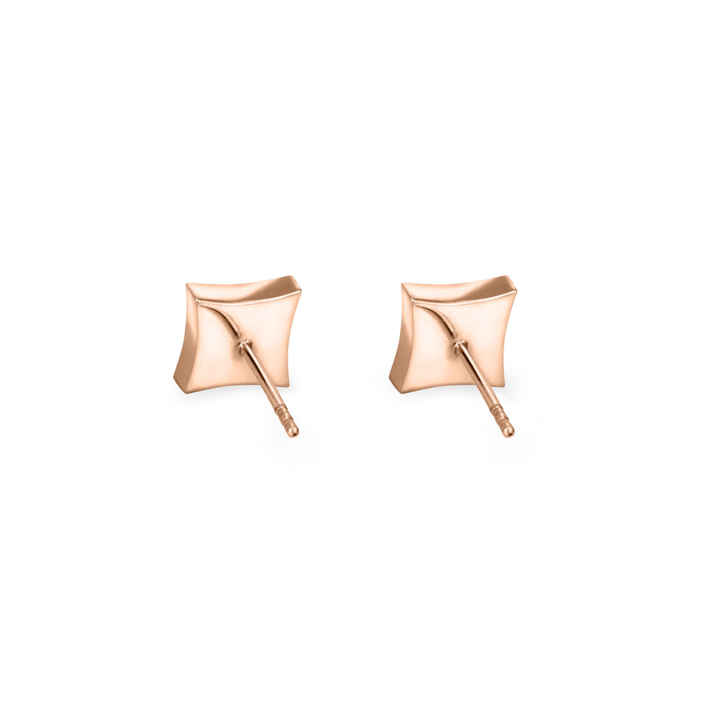 A back view of a pair of Close By Me's Luminary Stud Cremation Earrings in 14K Rose Gold set against a solid white background.