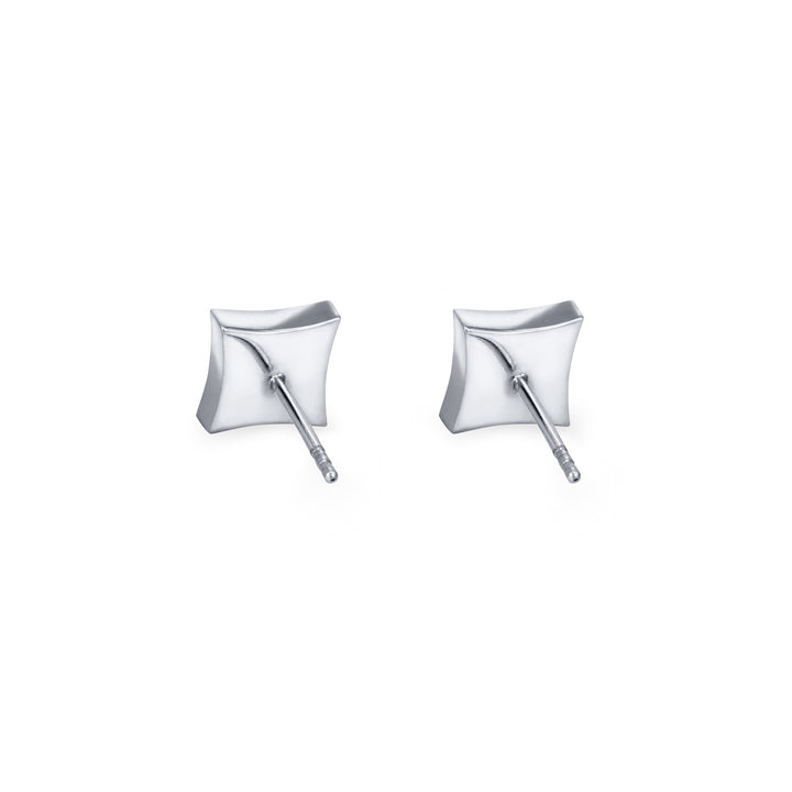 A back view of a pair of Close By Me's Luminary Stud Cremation Earrings in 14K White Gold set against a solid white background.