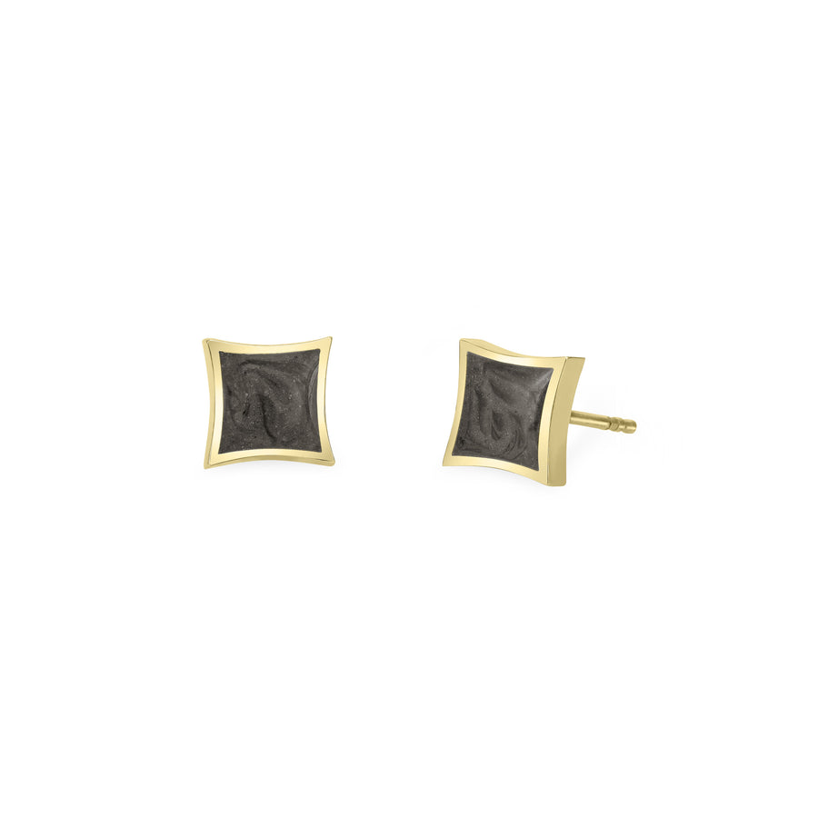 A pair of Close By Me's Luminary Stud Cremation Earrings in 14K Yellow Gold set against a solid white background. A front view is shown for the left earring while the right earring is turned to show a side view.