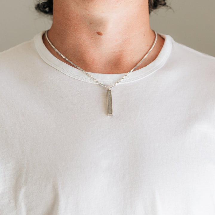 Close By Me Jewelry's Long Bar Cremation Necklace being worn by a young man.