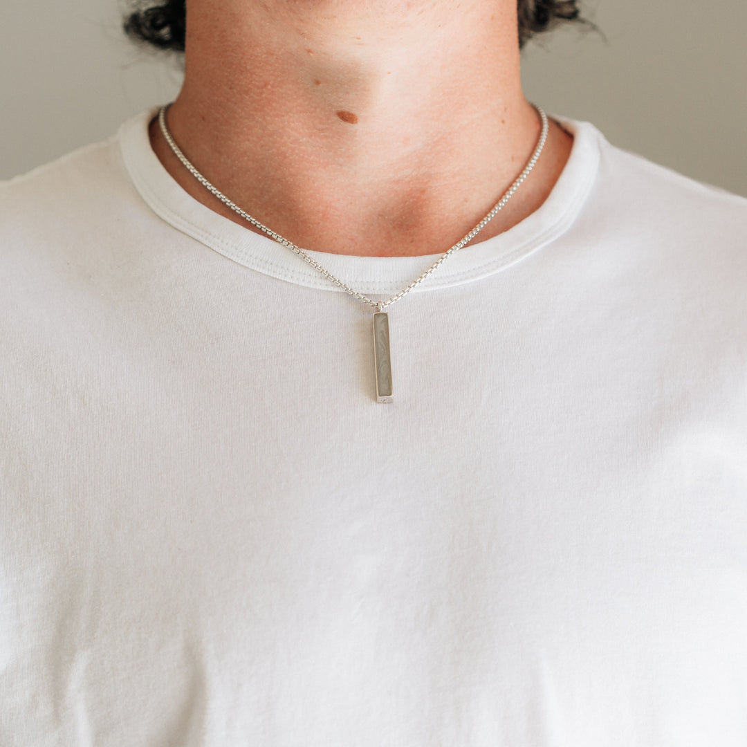 Close By Me Jewelry's Long Bar Cremation Necklace being worn by a young man.