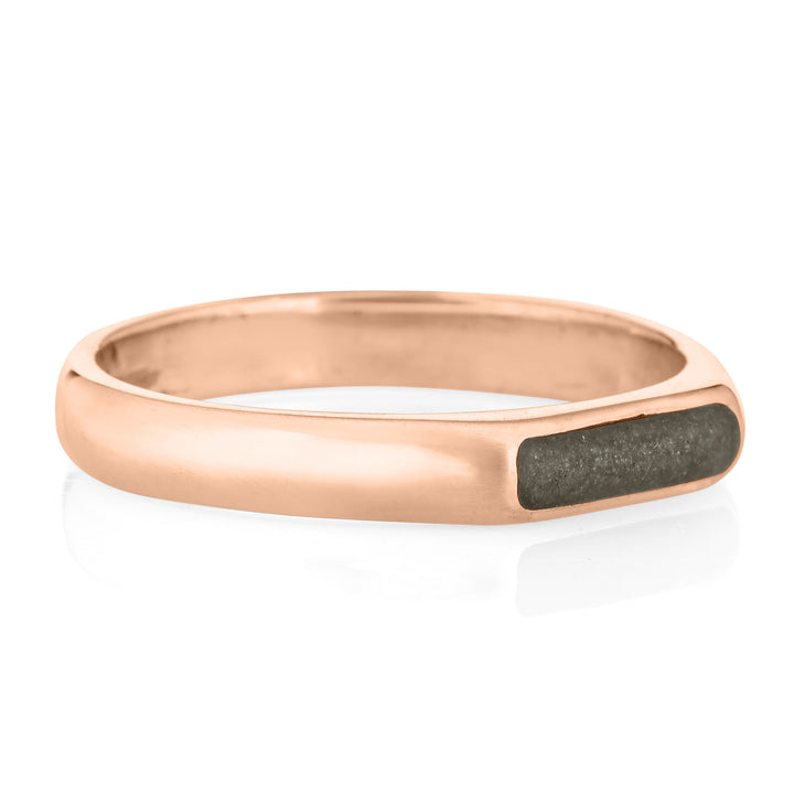 A men's memorial ashes ring simple band in 14k rose gold from the side with a white background