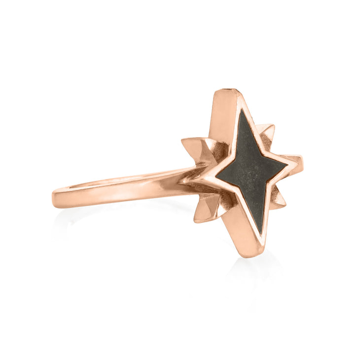 side view of close by me's 14k rose gold north star cremation ring