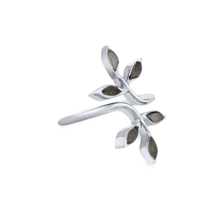 Pictured here is close by me jewelry's 14K White Gold Olive Branch Ashes Ring from the side to show the thickness of the casting and its multicolored cremation settings