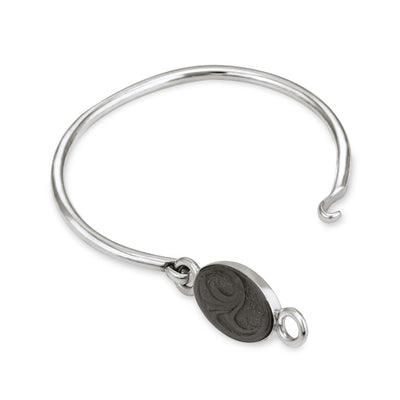 Oval Clasp Cremation Bracelet in Sterling Silver pictured unclasped with a white background