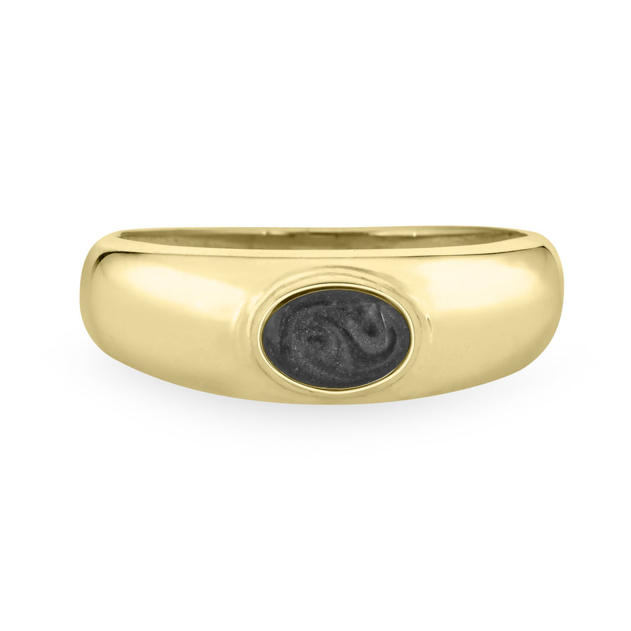 Centered against a stark white background, this 14K Yellow Gold Oval Dome Cremation Ring from Close By Me Jewelry features an ashes setting that is dark grey in color with a subtle swirled pattern visible.