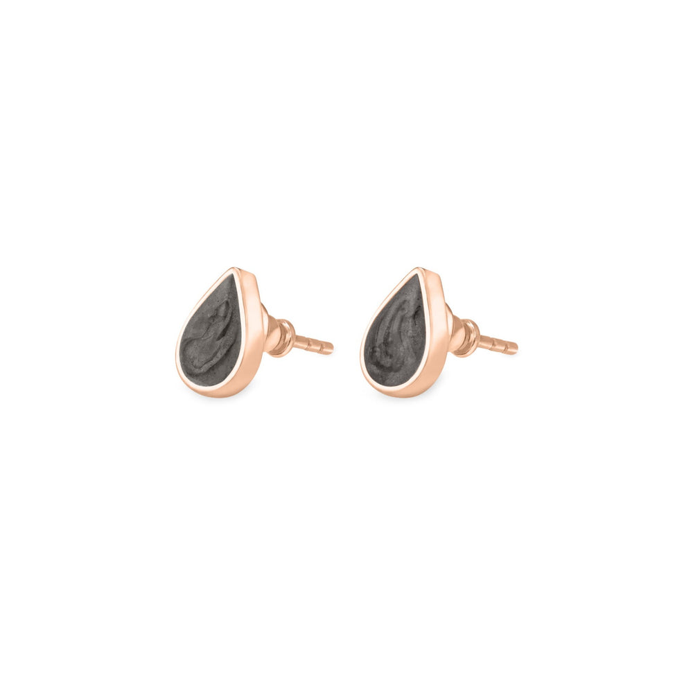 Pear stud cremation earrings in 14k rose gold shown from the side