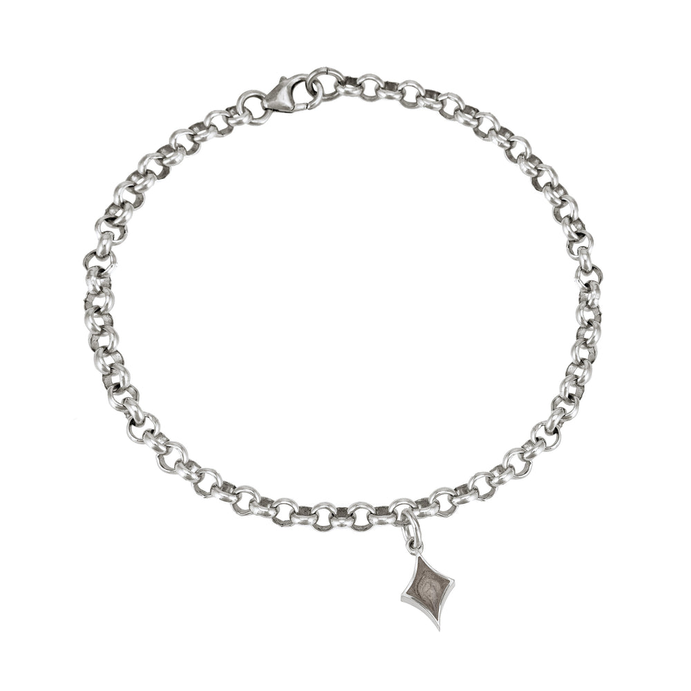 Rolo Chain Bracelet in Sterling Silver shown with a small diamond charm on.