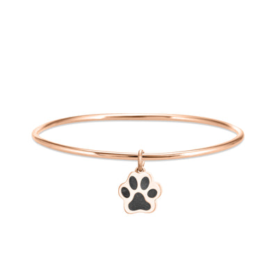 14k rose gold single bangle cremation bracelet with paw print ashes charm shown from the front