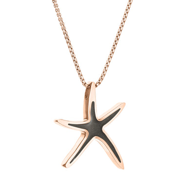 A close-up, side view of Close By Me's Sea Star Cremation Pendant in 14K Rose Gold against a solid white background.