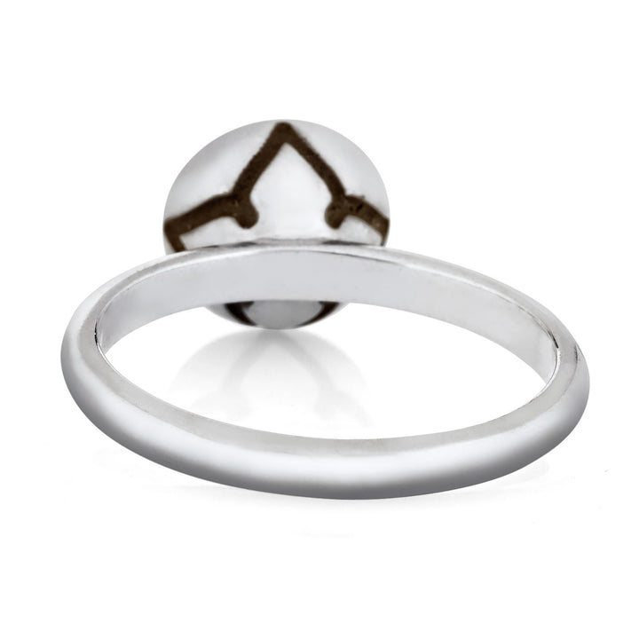 This photo shows the Signature Lotus Stackable Band Cremation Ring in 14K White Gold, designed by close by me jewelry, from the back