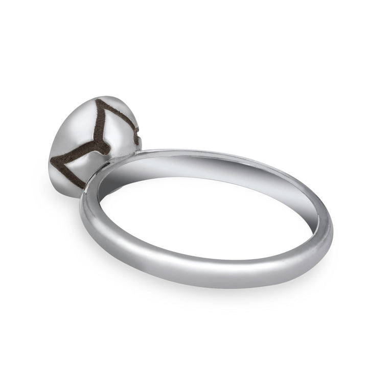 This photo shows the Signature Lotus Stackable Band Cremation Ring in 14K White Gold, designed by close by me jewelry, from the back at an angle