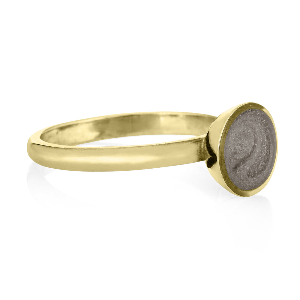 Pictured here is the 14K Yellow Gold Signature Lotus Stackable Band Cremains Ring designed by close by me jewelry from the front at an angle