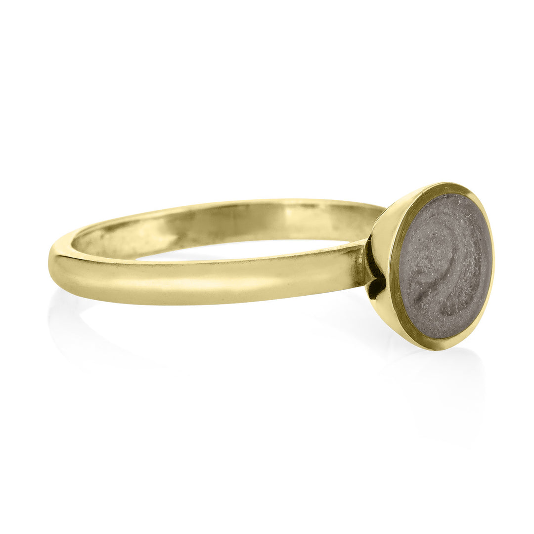 Pictured here is the 14K Yellow Gold Signature Lotus Stackable Band Cremains Ring designed by close by me jewelry from the front at an angle
