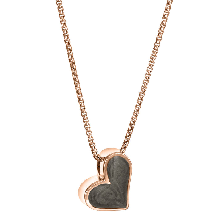 The Signature Sliding Heart Cremation Pendant in 14K Rose Gold and set with ashes by close by me jewelry from the side