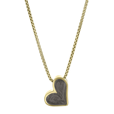 The Signature Sliding Heart Cremains Pendant in 14K Yellow Gold and set with ashes by close by me jewelry from the front