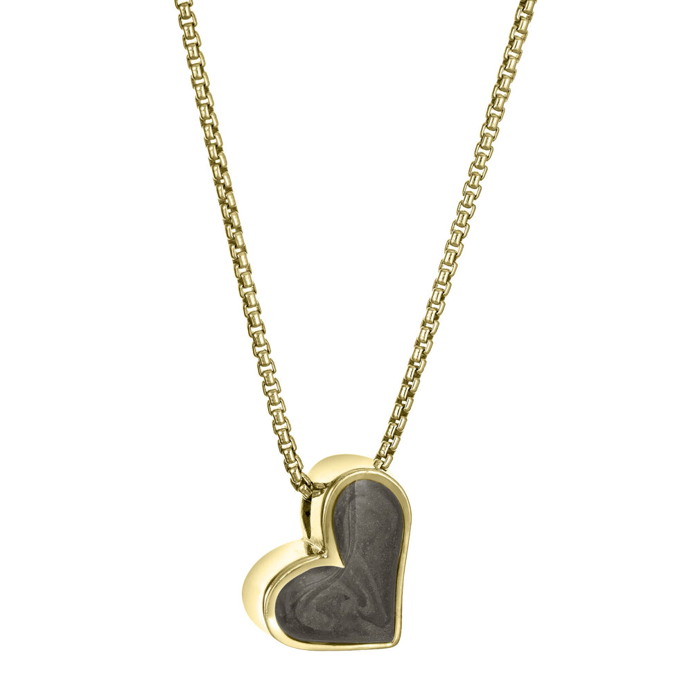 The Signature Sliding Heart Cremains Pendant in 14K Yellow Gold and set with ashes by close by me jewelry from the side