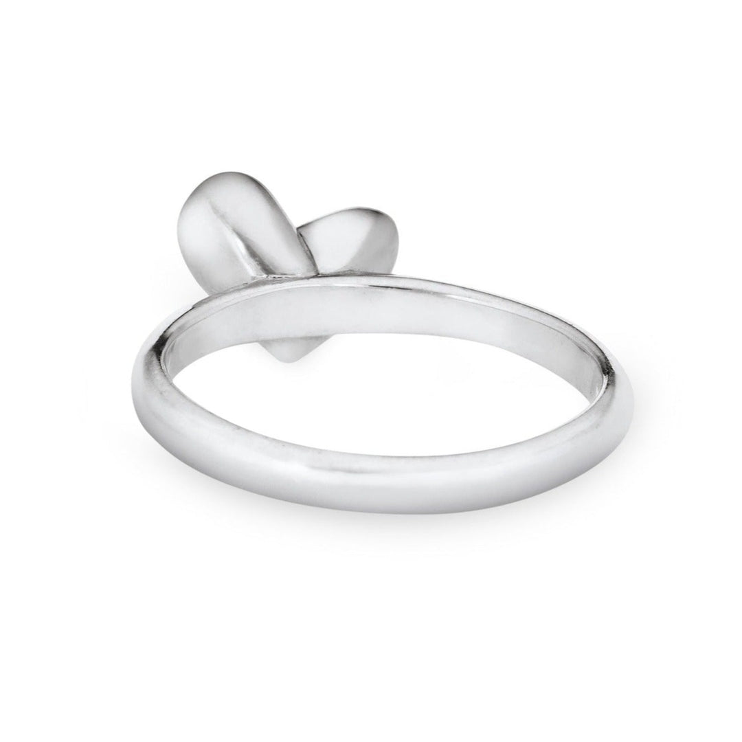 This photo shows the Signature Heart Stackable Band Ashes Ring designed by close by me jewelry in 14K White Gold from the back