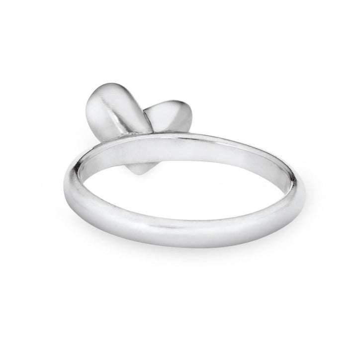 This photo shows the Signature Heart Stackable Band Ashes Ring designed by close by me jewelry in 14K White Gold from the back